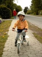 On his own bicycle - May 2003