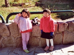Cecilie and Yanmei take a break from watching the Panda's
