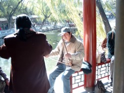 Playing traditional Chinese instruments and music in the Summer Palace
