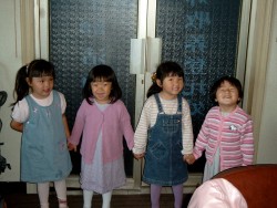 Four, soon to be, big sisters - Melanie, Caroline, Cecilie and Yanmei - waiting expectantly