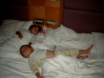 Daji and Yanmei asleep again - Daji crawls all over the bed whilst he sleeps