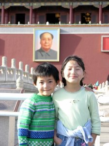 Yanmei and Daji in front of the world famous portrait of Mao