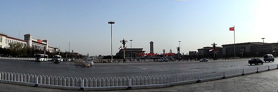 Panorama view of Tiananmen Square at sunset - museums on the left, Mao's  Mausoleum in the centre and the Great Hall of the People on the right
