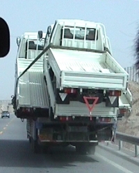 Lorry carrying 3 other lorries!