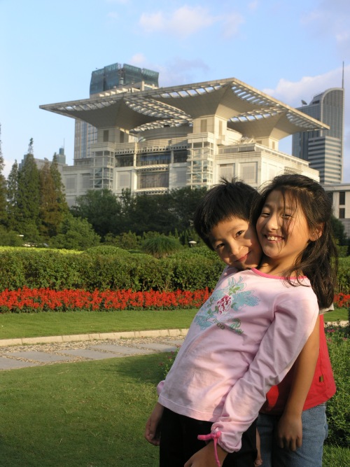 Yanmei and Daji infront of the Shanghai Municiple Government building