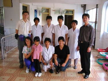 The Stirling family with staff and director from Yiwu. They visited the orphanage in September 2002. Used with the kind permission of the Stirling family.